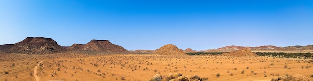 Narrow Size Scenic View of Desert Against Clear Sky